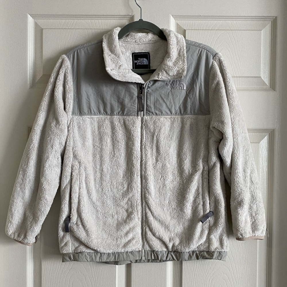 The North Face girls off white fuzzy fleece jacket.